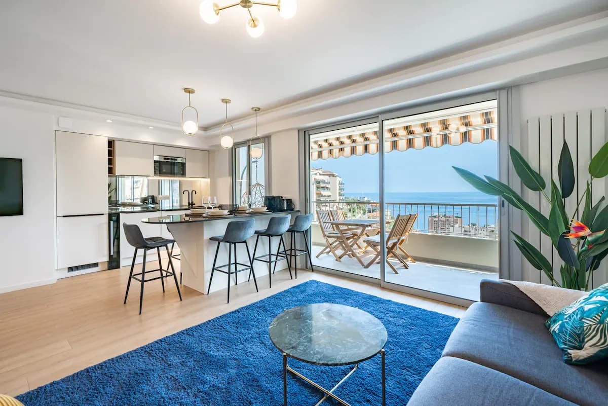 Living and kitchen with open balcony showing Mediterranean light